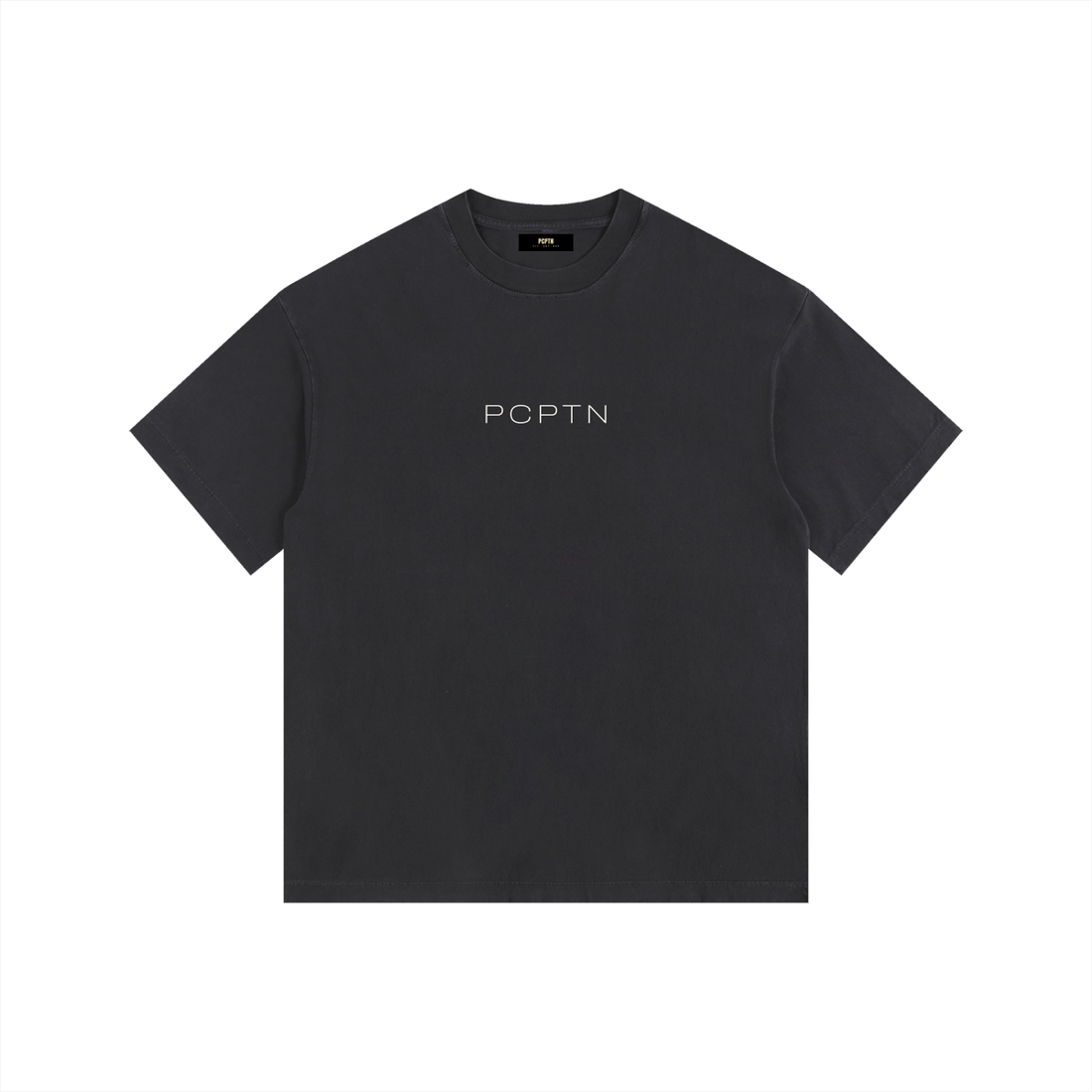 Vintage washed oversized cotton t-shirt showing the drop shoulder