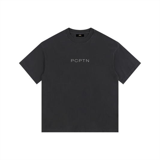 Vintage washed oversized cotton t-shirt showing the drop shoulder